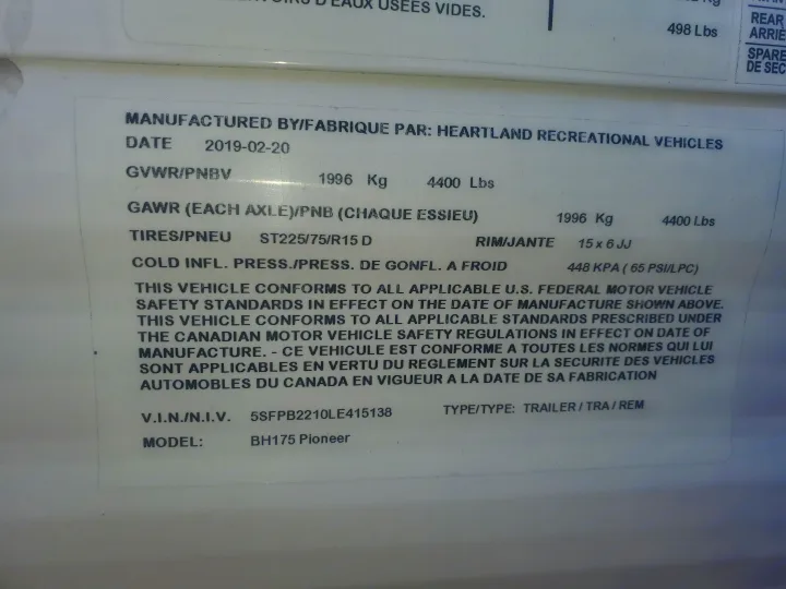 This RV rental vehicle certification sticker details specs like GVWR, tires, VIN (5SFPB2210LE415138), & model (BH175 Pioneer).. Heartland RVs Pioneer 2020