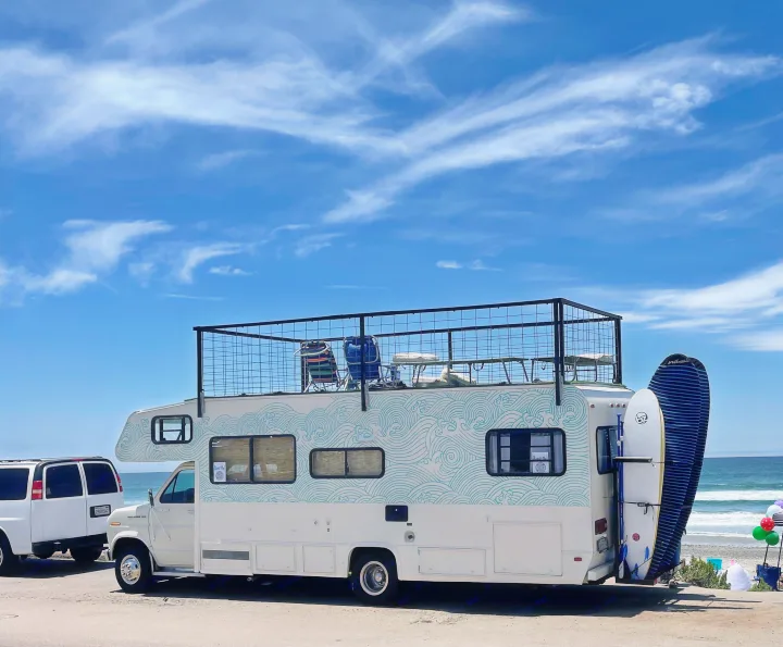 Stationed up at Torrey Pines State Beach with some surf and SUP gear. Coachmen E350 1991