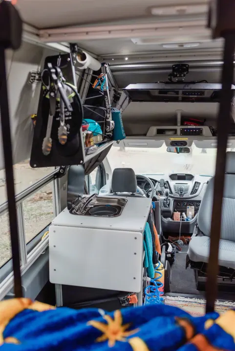 View of the kitchen pod and overhead cabinet. Ford Custom Transit 2019