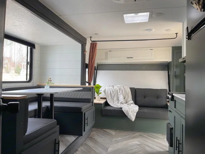 Spacious RV rental interior featuring a chic dinette, comfy lounge, and contemporary design.. Forest River 178BHSKX 2022