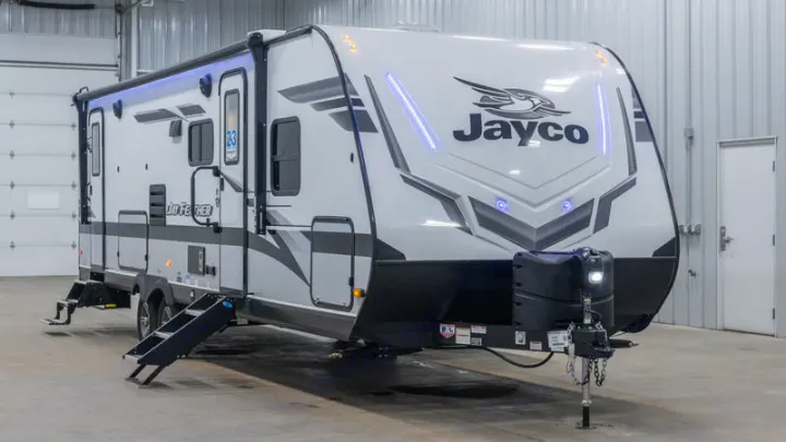 This modern white and black Jayco Jay Feather travel trailer with blue LEDs & deployable steps is perfect for your next RV rental adventure.. Jayco Jay Feather 2022