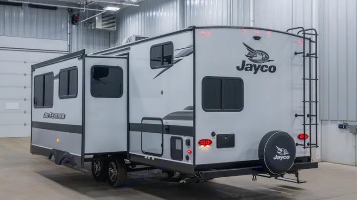 Light gray Jayco Jay Feather travel trailer with an extended slide-out, perfect for your next RV rental adventure.. Jayco Jay Feather 2022