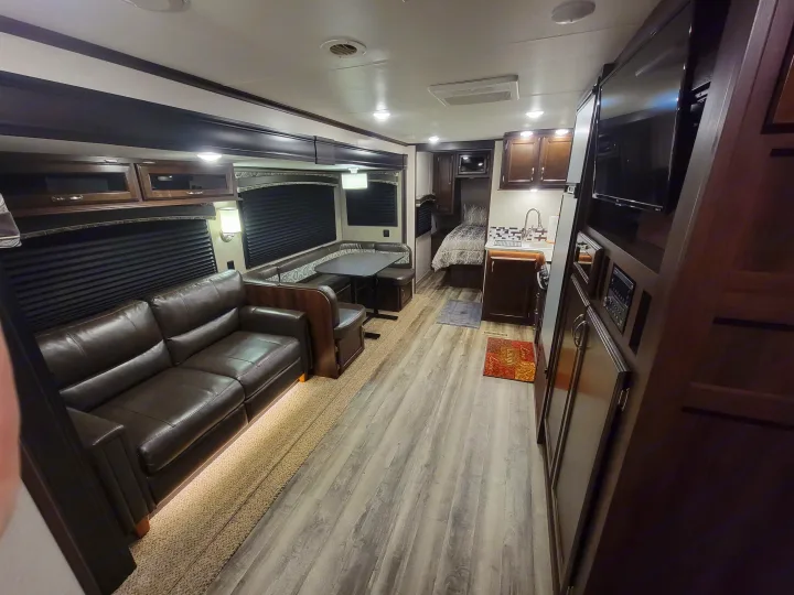 Spacious rv rental interior showcasing living, dining, kitchen, and bedroom.. Jayco Jay Flight 2018