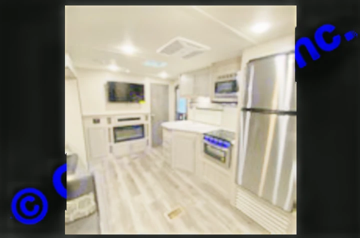 Modern, spacious RV rental interior: full kitchen, living area with TV & fireplace. Perfect for your next adventure.. Coachmen Catalina 2022
