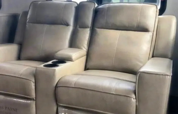 Comfortable, light-colored RV recliners with cup holders, perfect for relaxing in your rv rental.. Keystone RV Outback Ultra-Lite 2020
