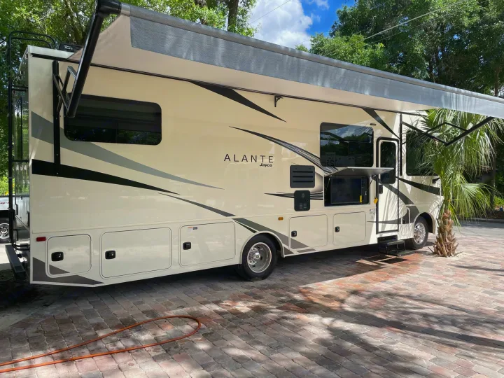 Beautiful Jayco Alante RV rental parked on a sunny patio, awning extended. Your next adventure awaits.. Other Other 2022