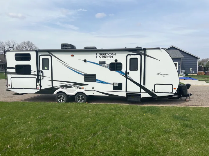 The left does stretch out 4 foot makes a huge living room areas and dining room for the kitchen . Coachmen Freedom express 2020