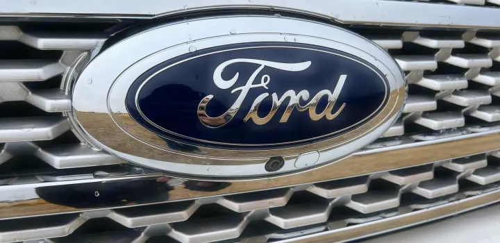 Ford vehicle's front grille, emblem, and camera, ideal for your next RV rental journey.. Ford Ford Expedition 2021