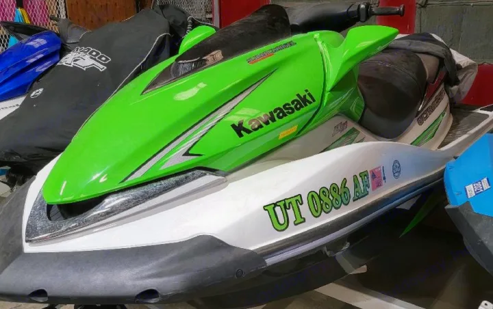 This vibrant green Kawasaki jet ski is prepped for lake fun. A great addition to any adventure, perhaps with an RV rental.. Kawasaki Other 2008