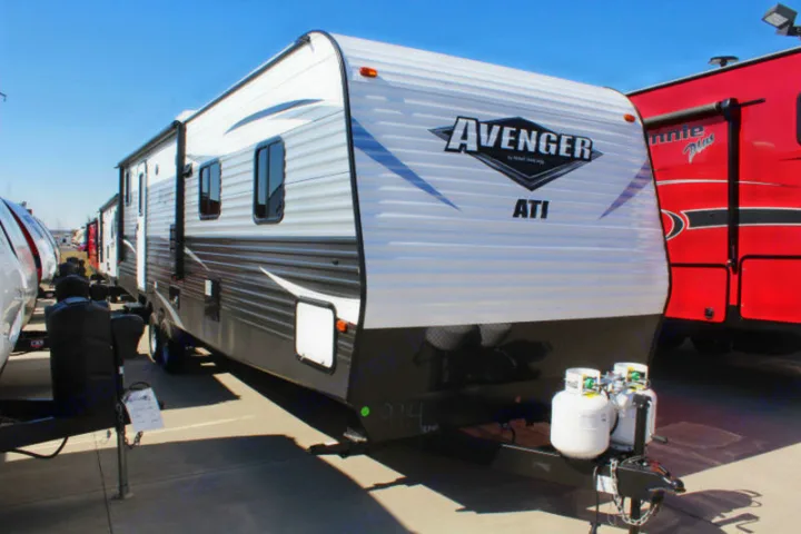 Front view of an Avenger ATI travel trailer. Consider this white and gray RV for your next rv rental adventure.. Avenger ATI 2020