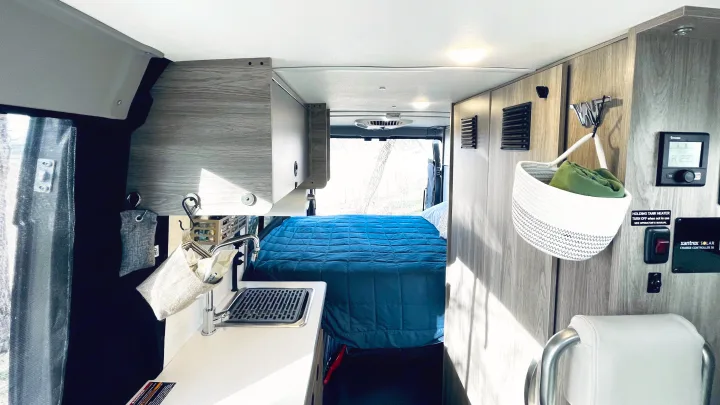 All clean and new, comfortable bed with soft topper pad and a zen place to take an afternoon nap.

At 6'2", the murphy bed is just long enough for me.. Winnebago Solis 2023