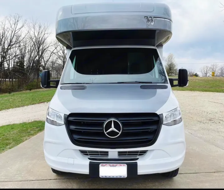 Front view of a white Mercedes-Benz Sprinter Winnebago camper van RV rental.. Winnebago View 24J 2020