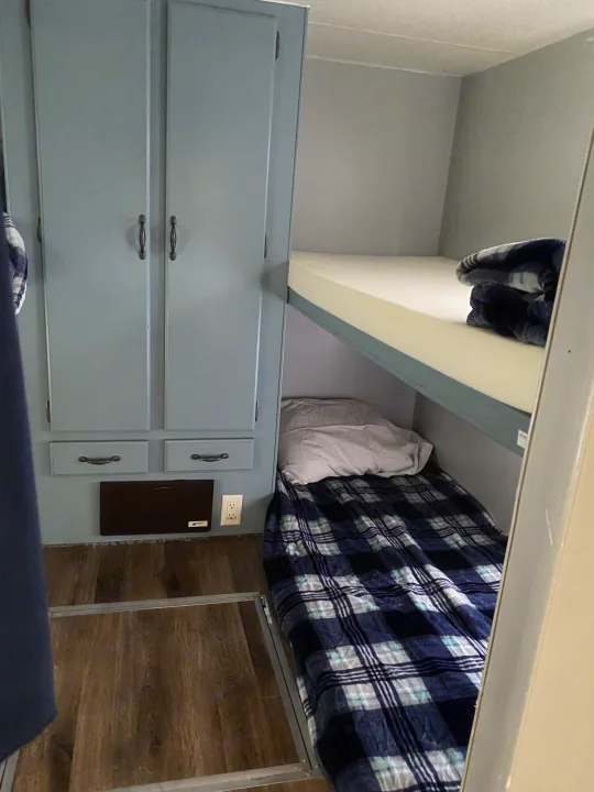 The second set of bunks in the back of the camper . Fleetwood Mallard 2000