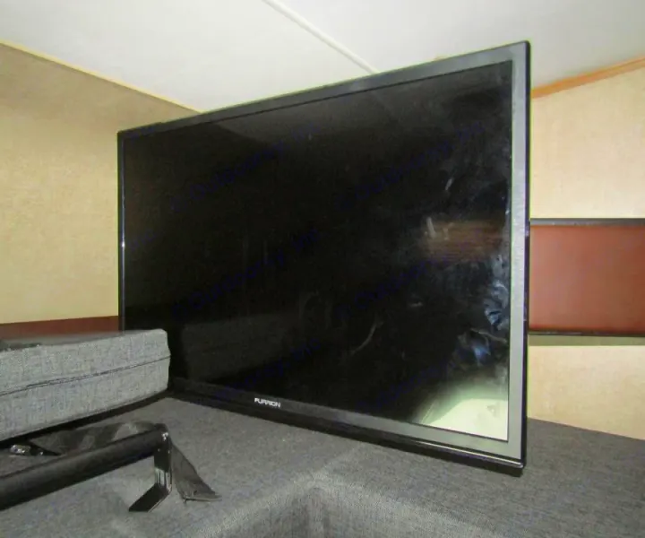 Furrion TV in an RV rental, providing entertainment in a compact living space.. Coachmen Leprechaun 2017
