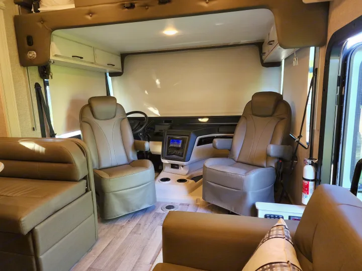Experience this modern RV rental interior: spacious cockpit with comfortable seating and a welcoming living area.. Jayco Alante 2022