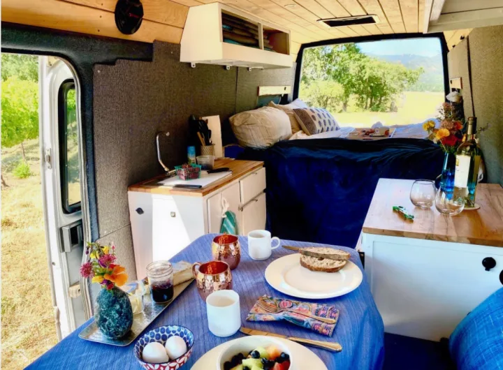 Inviting RV rental camper van interior. Enjoy breakfast, a cozy bed, and nature's beauty from your mobile home.. Mercedes Sprinter 2005