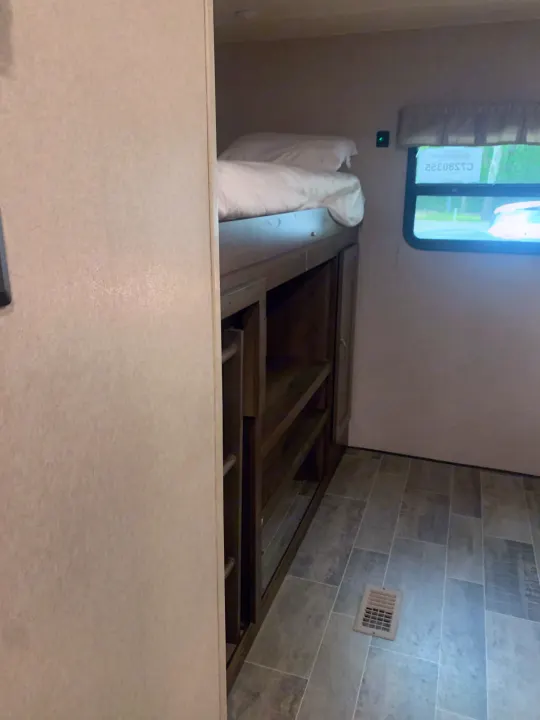 Step inside this RV rental! Features include comfy bunk beds, built-in storage, and a large window.. Palomino Puma 2018