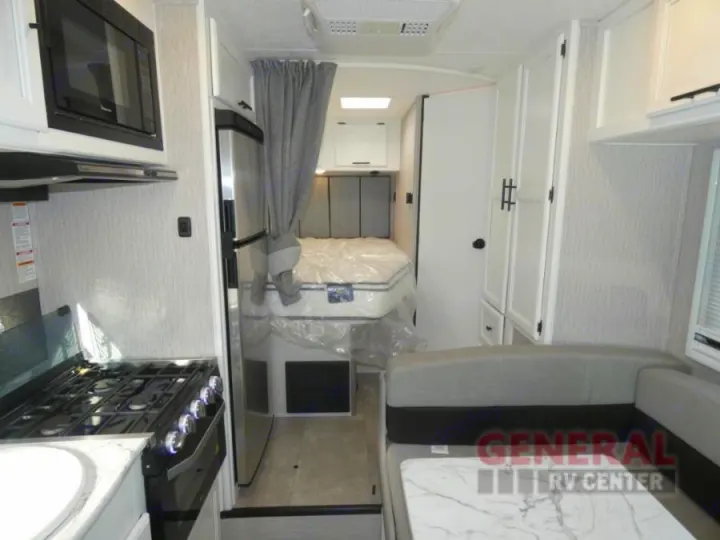 RV rental interior: kitchen, bedroom, & dinette area for comfortable travels.. Forest River Coachmen Cross Trail XL 2022