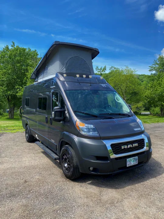 Dark gray Ram ProMaster pop-top camper van, an ideal rv rental for Alaska travel and adventures.. Winnebago Solis 2022