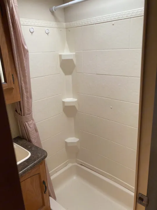 RV rental: Clean, compact bathroom with shower and sink for your travels.. Forest River Salem 2011