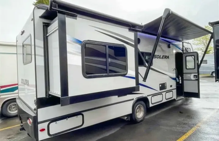 White Solera RV rental with extended slide-out and deployed awning, ready for adventures.. Forest River Solera 2022