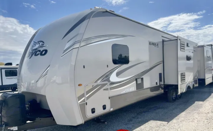 Light-colored Jayco Eagle HT fifth-wheel RV with extended slide-outs, perfect for an rv rental adventure.. Jayco Eagle HT 2020