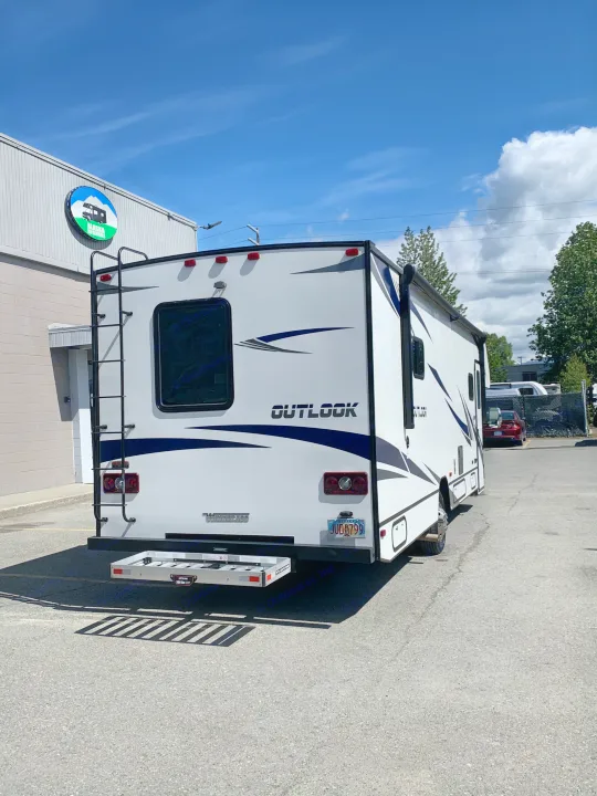 White Winnebago Outlook RV rental parked at Alaska RV Rentals. This leisure vehicle is ready for outdoor adventures.. Winnebago Outlook 2020