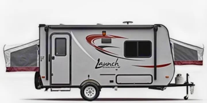 Side view of a light-colored travel trailer with pop-out beds and an awning, ideal for RV rental adventures.. Starcraft Launch 2016