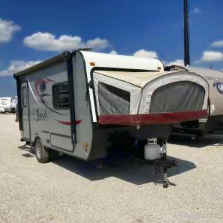 Explore this light gray hybrid travel trailer, a great option for your next RV rental adventure.. Starcraft Launch 2016