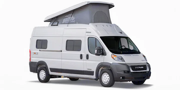 A white Winnebago Solis camper van with a raised pop-top roof, great for your next rv rental adventure.. Winnebago Solis 2023