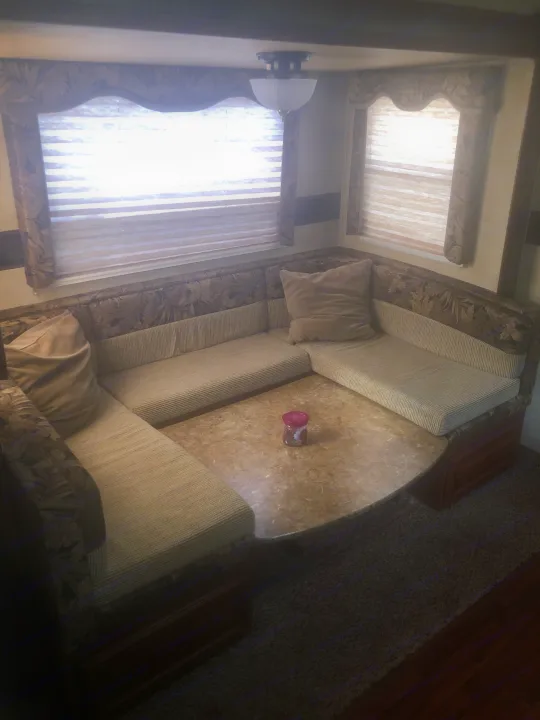 This sleeps 1-2 people when cushions are placed / table extends up for dining area . Keystone RV Outback 2011