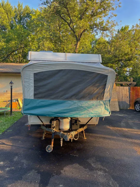 Pop-up camper shown for your next RV rental adventure. Perfect for camping & outdoor travel leisure.. Coleman Destiny Taos 1996