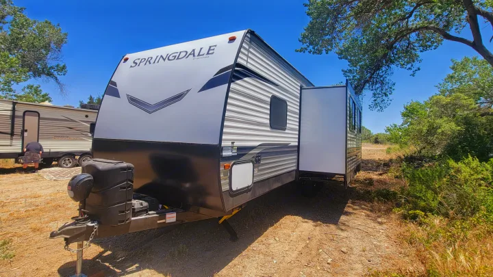 Explore the outdoors in this Springdale travel trailer, available as an RV rental with extended slide-out.. Keystone RV Springdale 2022