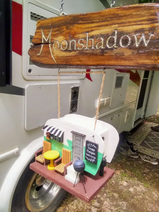"Moonshadow" RV with decorative miniature camper sign. A unique touch for your next RV rental or camping adventure!. Forest River Sunseeker 2018