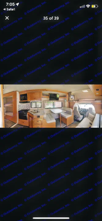 RV rental interior: A panoramic view showing the kitchen with stove, dinette, bunk beds, and front cab for your journey.. Winnebago Minnie Winnie 2019