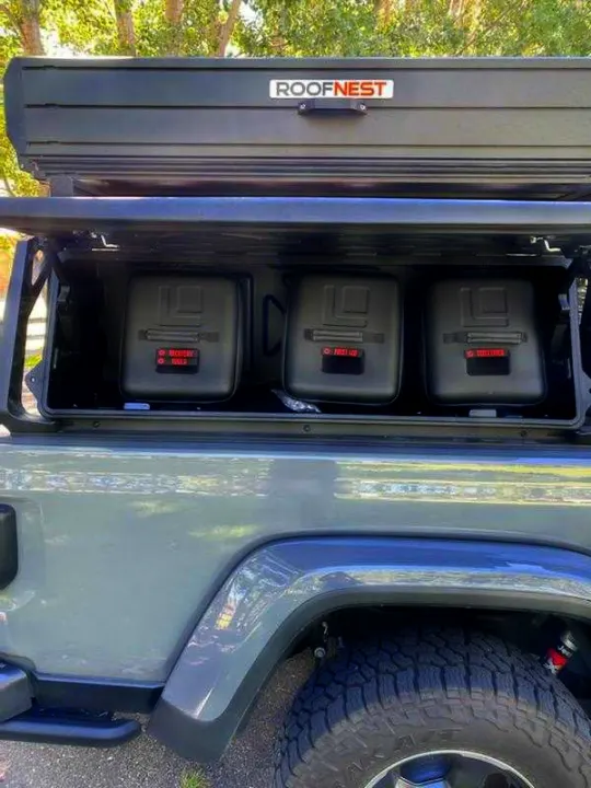 Explore with this Jeep Gladiator RV rental, featuring a Roofnest tent & integrated bed storage for recovery, first aid.. Other Other 2021