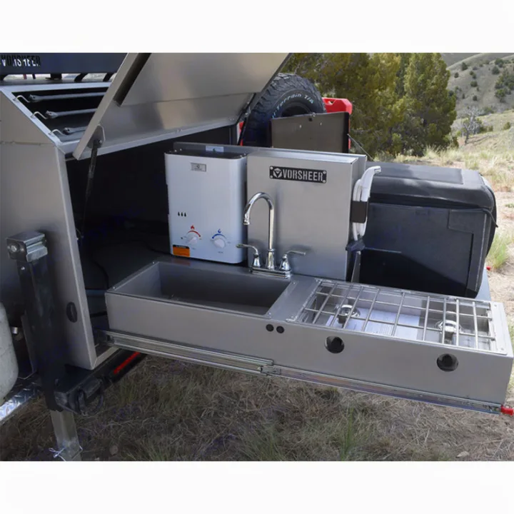 An rv rental showing a pull-out outdoor kitchen: sink, faucet, water heater, & stovetop for convenient off-grid camping.. Vorsheer Vorsheer Trailer 2022