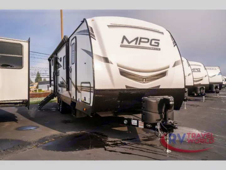 Front-facing view of white MPG Ultra-Lite travel trailers on a lot, ready for your next RV rental adventure.. Cruiser RV MPG Ultra Lite 2022