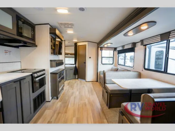 Spacious RV rental interior featuring a modern kitchen, comfortable dining area, and bright living space.. Cruiser RV MPG Ultra Lite 2022