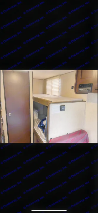 Cozy rv rental interior featuring bunk beds, a window with blinds, and a control panel, ideal for family travel.. Forest River Cherokee Wolf Pup 2018