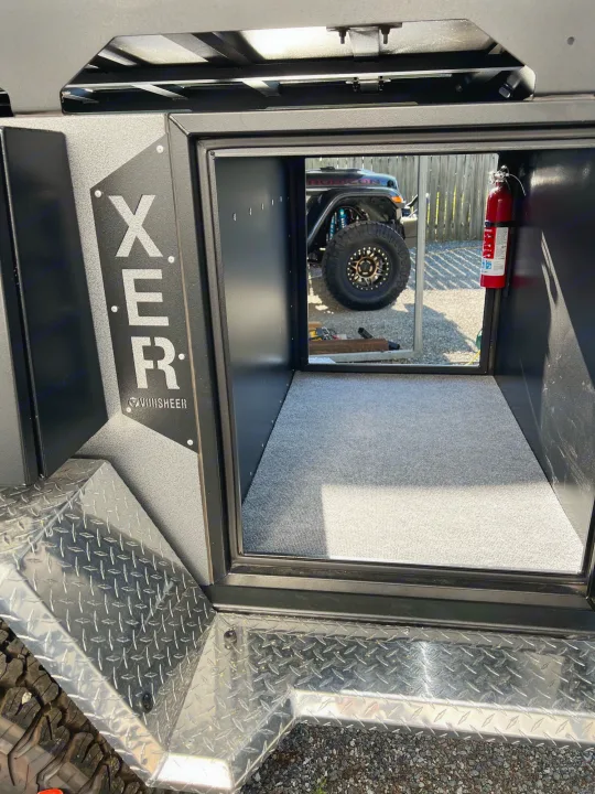 XER VORSHEER off-road utility trailer interior: carpeted storage, fire extinguisher. Ideal for RV rental adventures!. Vorsheer Vorsheer Trailer 2022
