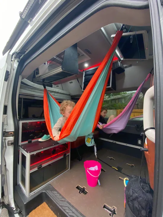 Kids enjoy colorful hammocks inside this cozy **rv rental**'s custom interior, great for family adventures.. Vandoit Vandoit Class B 2017