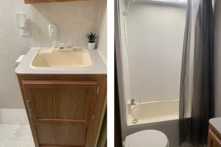 RV rental bathroom with vanity, sink, toilet, and full shower/tub combo with curtain.. Dutchmen Express 2001