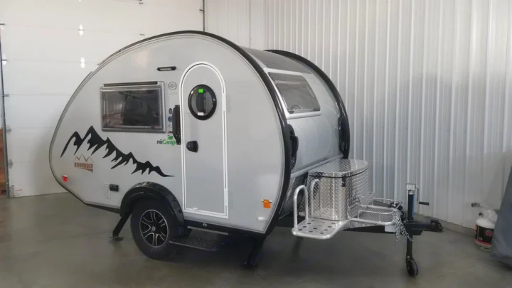 Modern silver teardrop camper, a perfect RV rental for your next adventure.. Nucamp TAB 320 CS-S 2022
