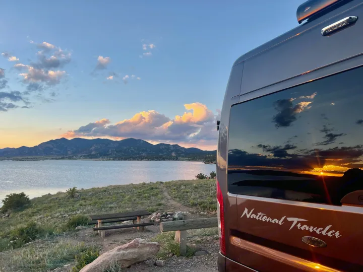 RV rental van offers stunning lakefront sunset views at a scenic campsite for your nature travel adventure.. Dodge Other 2020