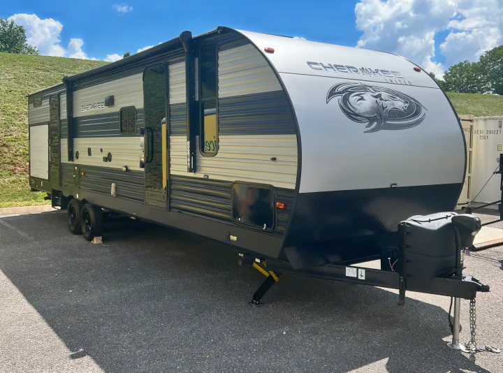 Cherokee Limited rv rental travel trailer in silver/black, featuring a bold wolf graphic. Perfect for your next trip.. Forest River Cherokee 2021