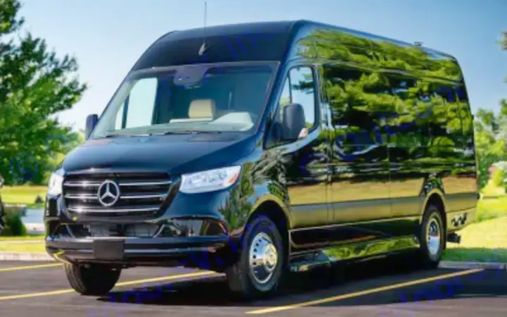 A black Mercedes-Benz Sprinter van, ideal for an RV rental or luxury transport, parked outdoors on a clear day.. Ultimate Toys Ultimate Coach 2023