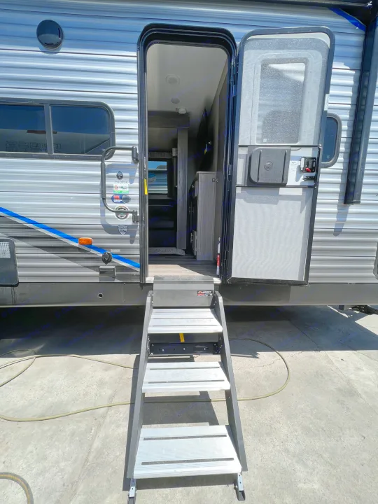 A welcoming view of an RV rental with its door open and SolidStep entry. Ready for your next journey in comfort.. Coachmen Catalina 2022