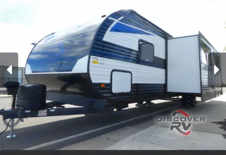 This modern travel trailer, with a blue and black design and extended slide-out, is ready for your next RV rental adventure.. Heartland Prowler 2022