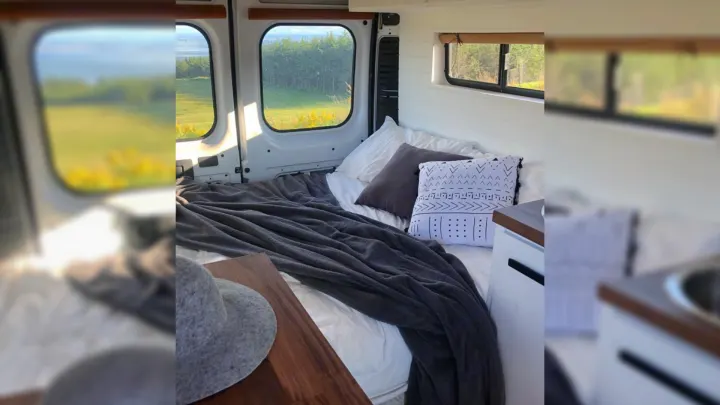 Step inside this inviting RV rental with a cozy bed, nature views from windows, and a compact kitchen. Your next adventure awaits!. RAM Promaster 2500 2017
